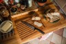 Нож кухонный Fiskars Functional Form 1057538 стальной для хлеба лезв.213мм серрейт. заточка черный/оранжевый